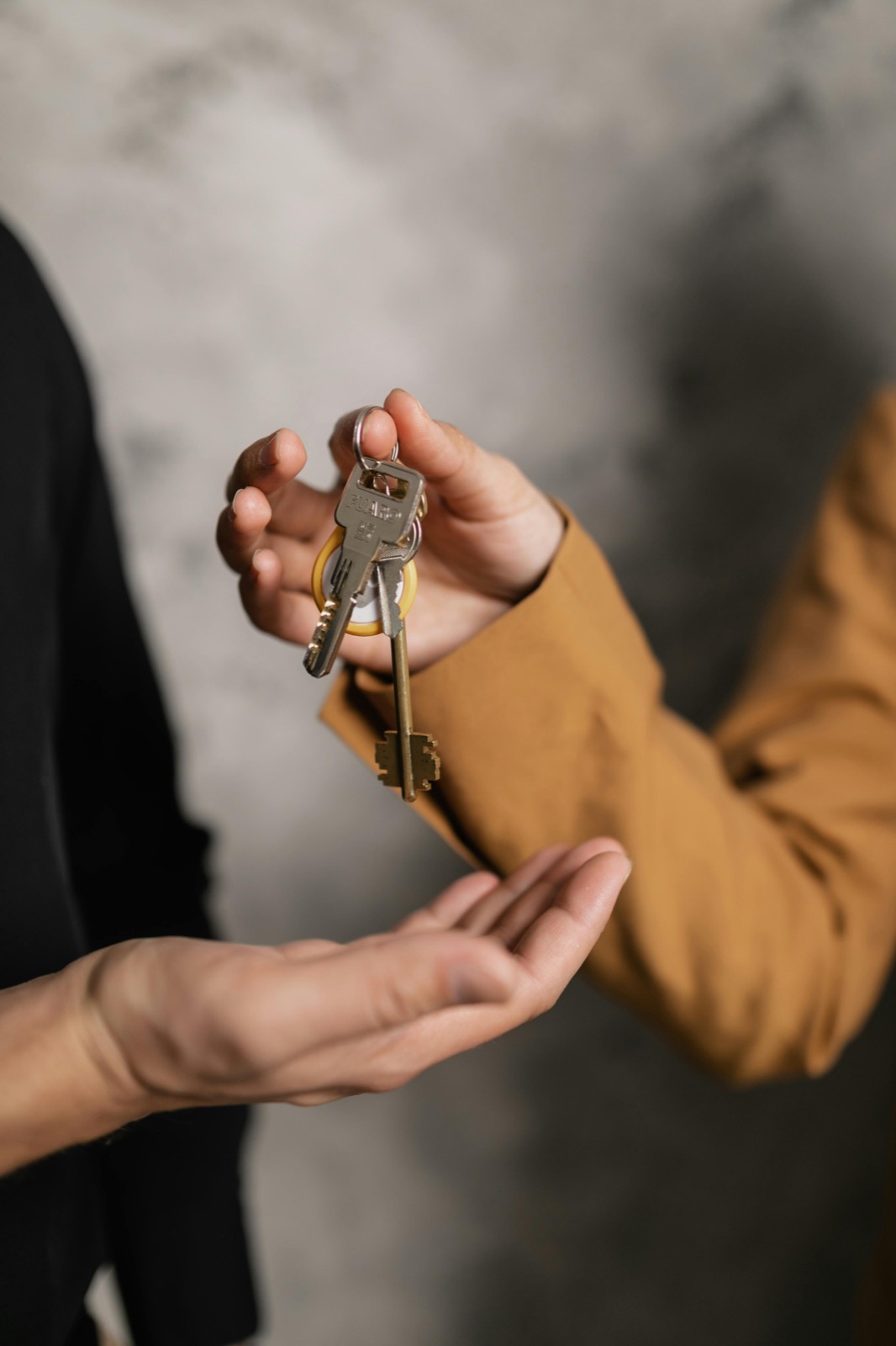Handing over keys after a successful sale